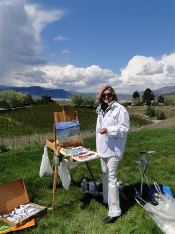 Angie painting at Therapy Vineyards for Plein Air Event